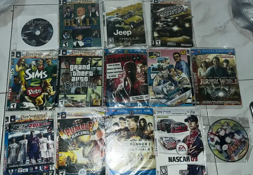 Kaset game ps2 ada 18 biji