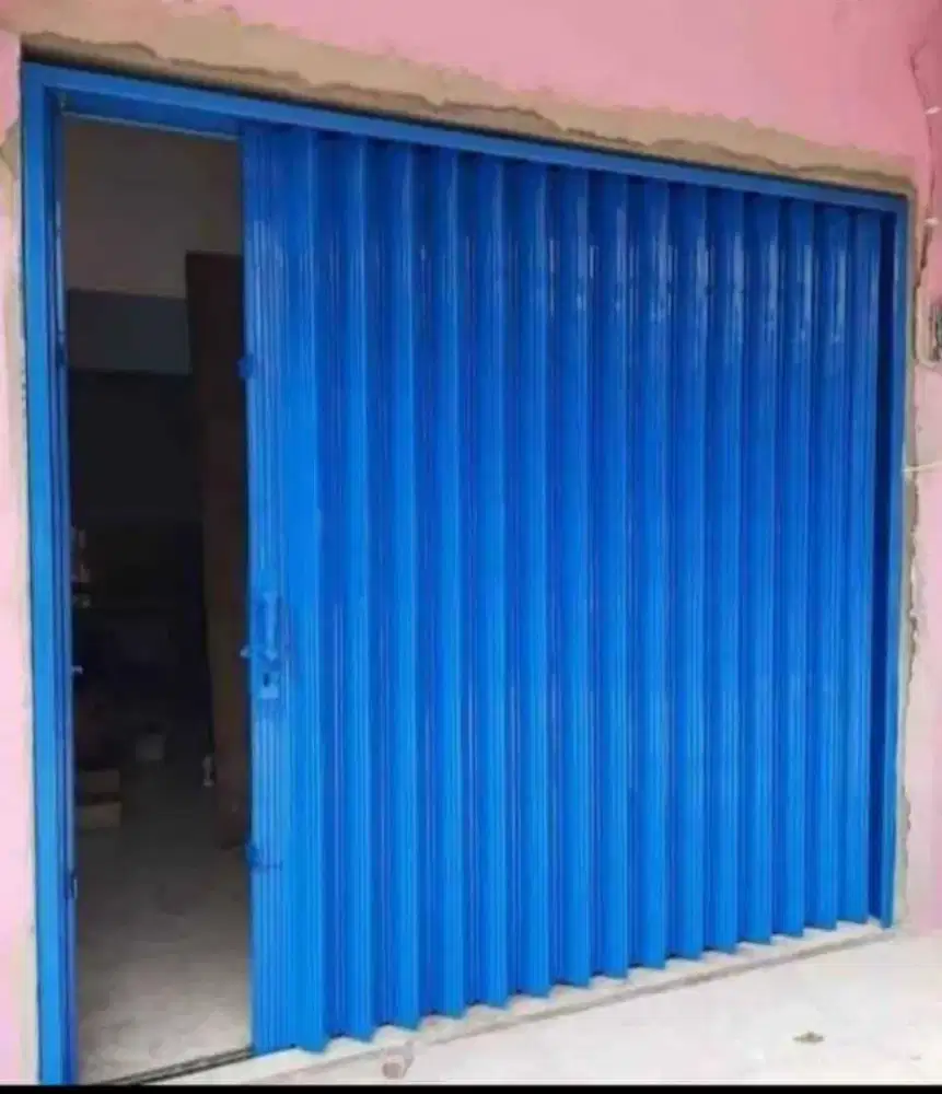 Folding gate besi