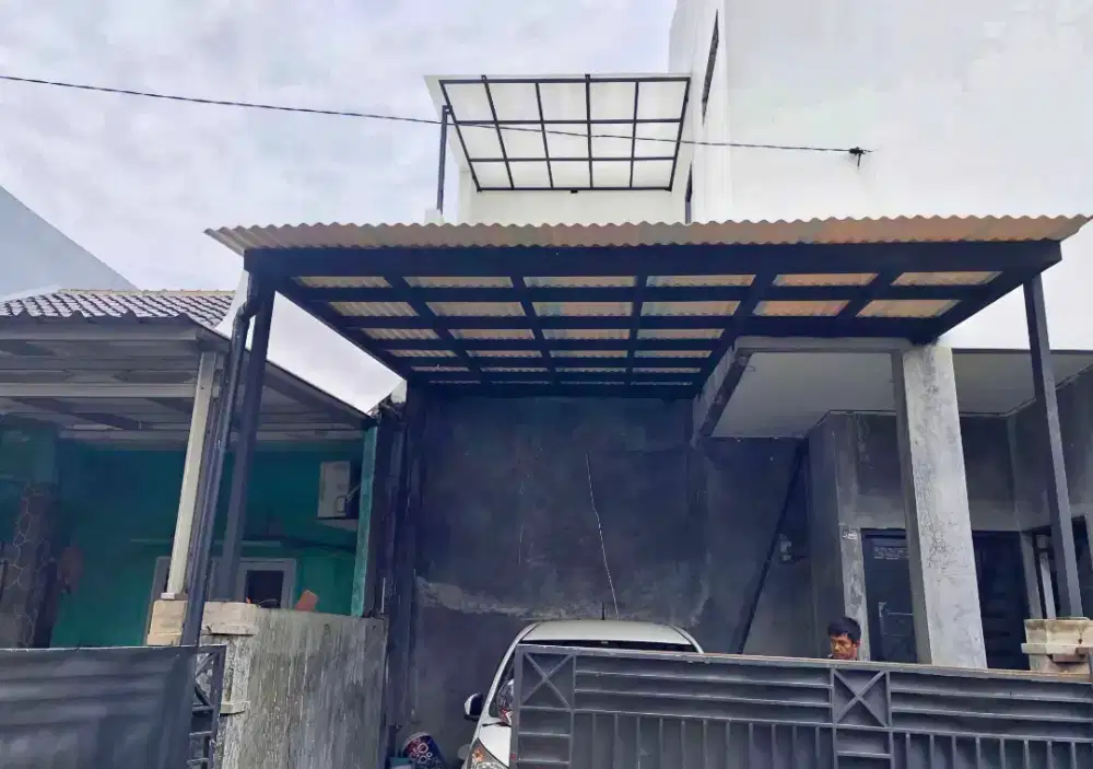 Kanopi baja ringan dan garasi