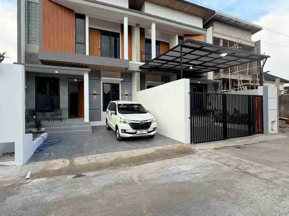 POLL MURAH..RUMAH MEWAH MODERN 2 LANTAI FURNISHED DENGAN ROOF TOP LUAS DI JALAN KALIURANG KM 13 NGEMPLAK