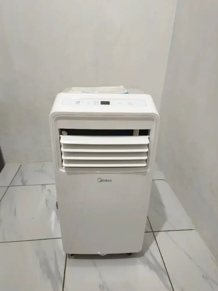 AC Portable Midea ½ PK Kondisi Like New