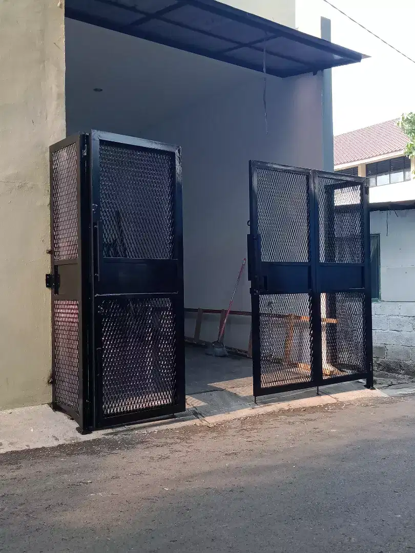 Pintu lipat garasi motif espanda