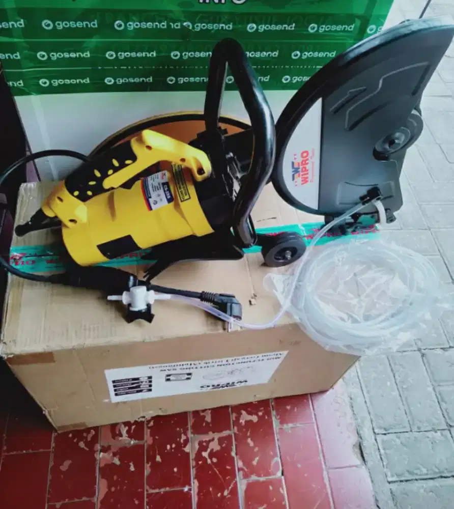 (RUMAH TEKNIK JOGJA)mesin potong beton,aspal model pegangan tangan