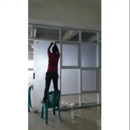 Jasa Pemasangan Kaca film /Stiker kaca gedung