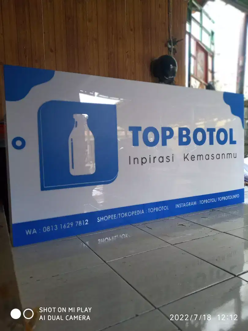Cutting sticker logo dan nama perusahaan