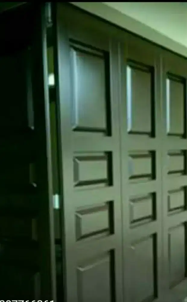 Pintu besi garasi press EISEN,cat oven POWDER COATING