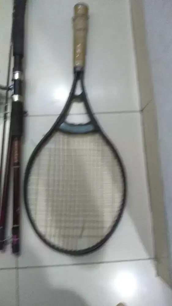 raket tennis layak pakai