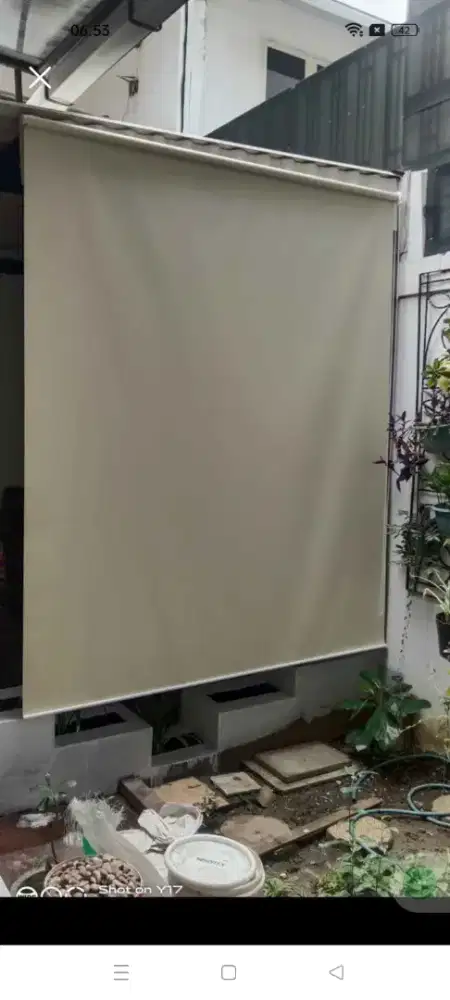 Tirai penahan hujan dan panas sinar matahari termurah
