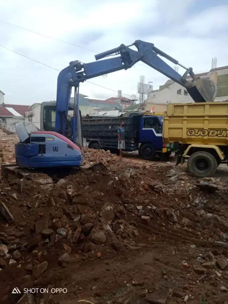Buang puing & kirim urug lahan transportasi truck dump