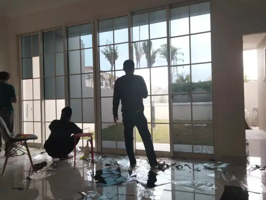 Pasang kaca film dan sticker sunblast