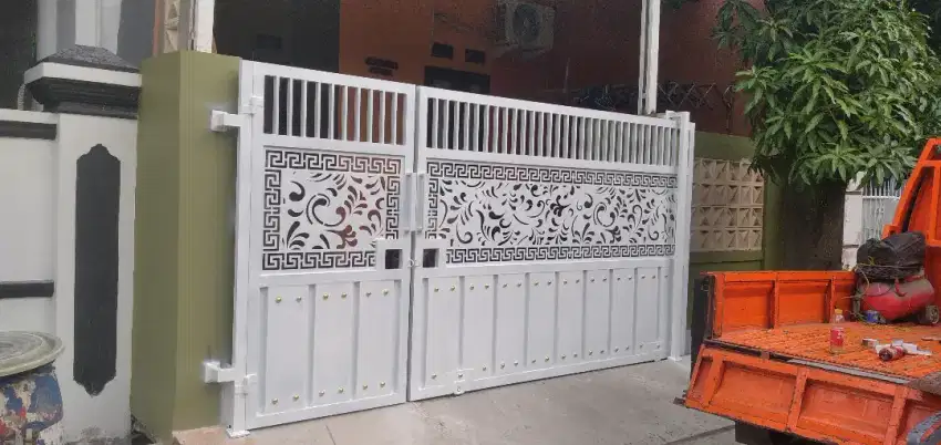 Pintu garasi motip laser
