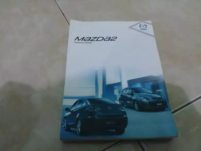 Buku manual Mazda 2 gen 1