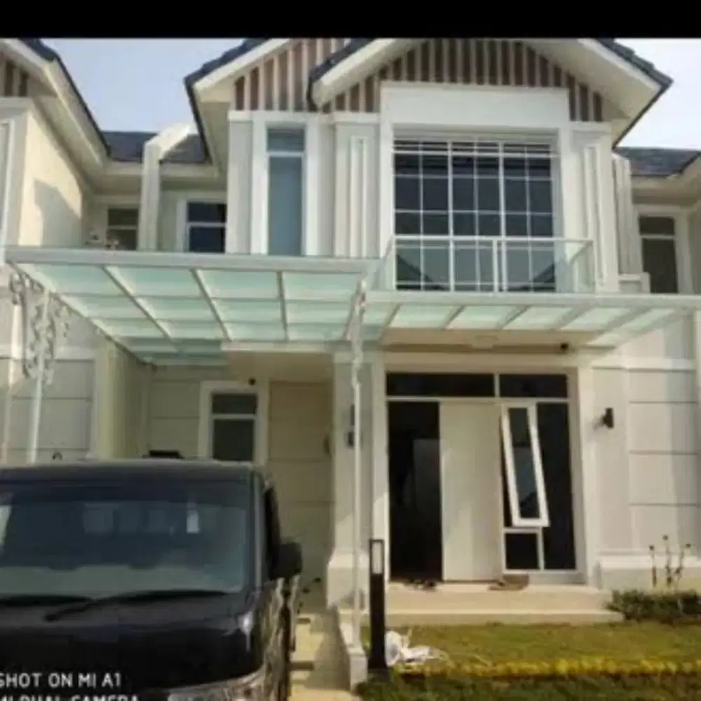 Canopy kaca desain rumah minimalis 890