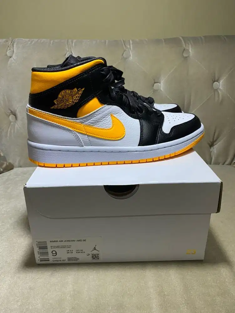 WOMAN AIR JORDAN 1 MID “LASER ORANGE” SE