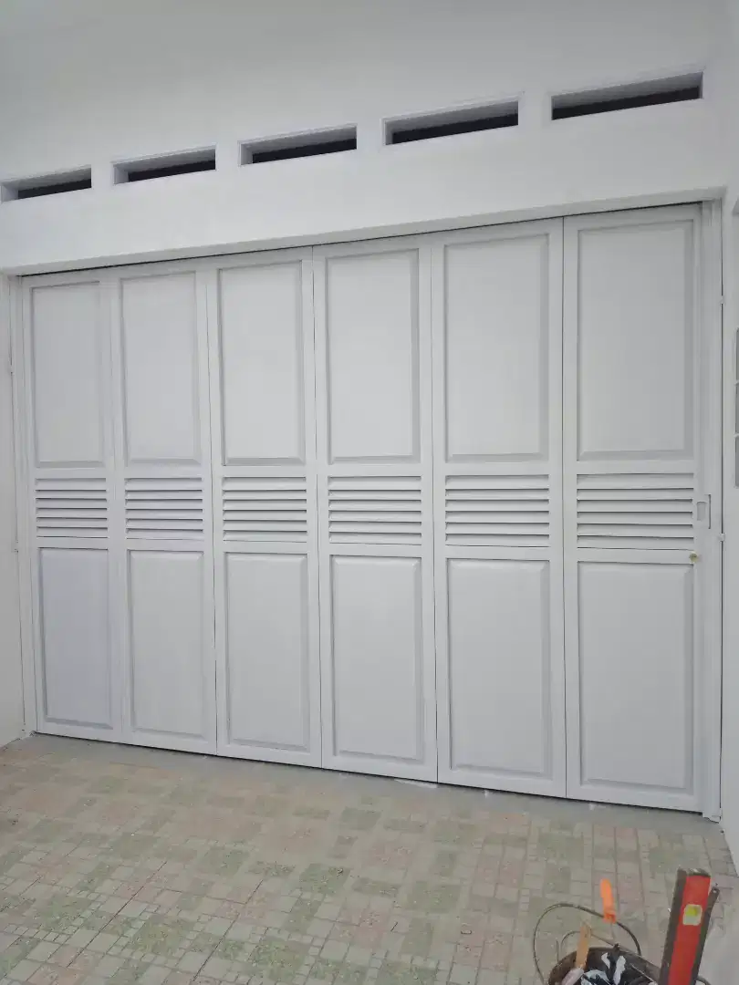 Pintu garasi sleding lipat besi handerson