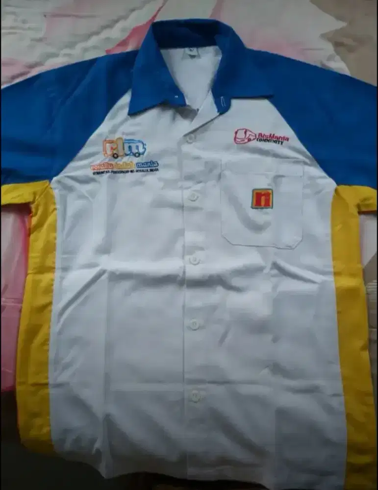 Kemeja bismania RIM Rosalia Indah Mania