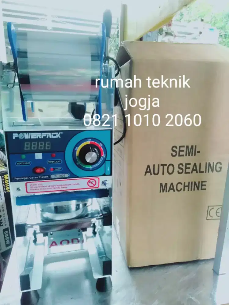 (rumah teknik jogja)mesin cup sealer semi otomatis,dilengkapi counter