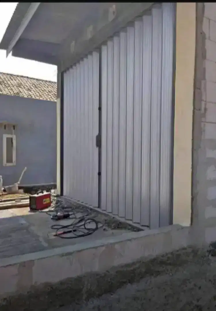 Rolling door folding gate