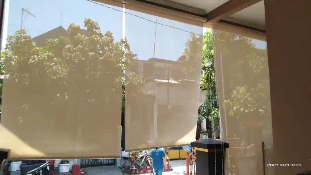 Tirai penahan hujan dan panas termurah