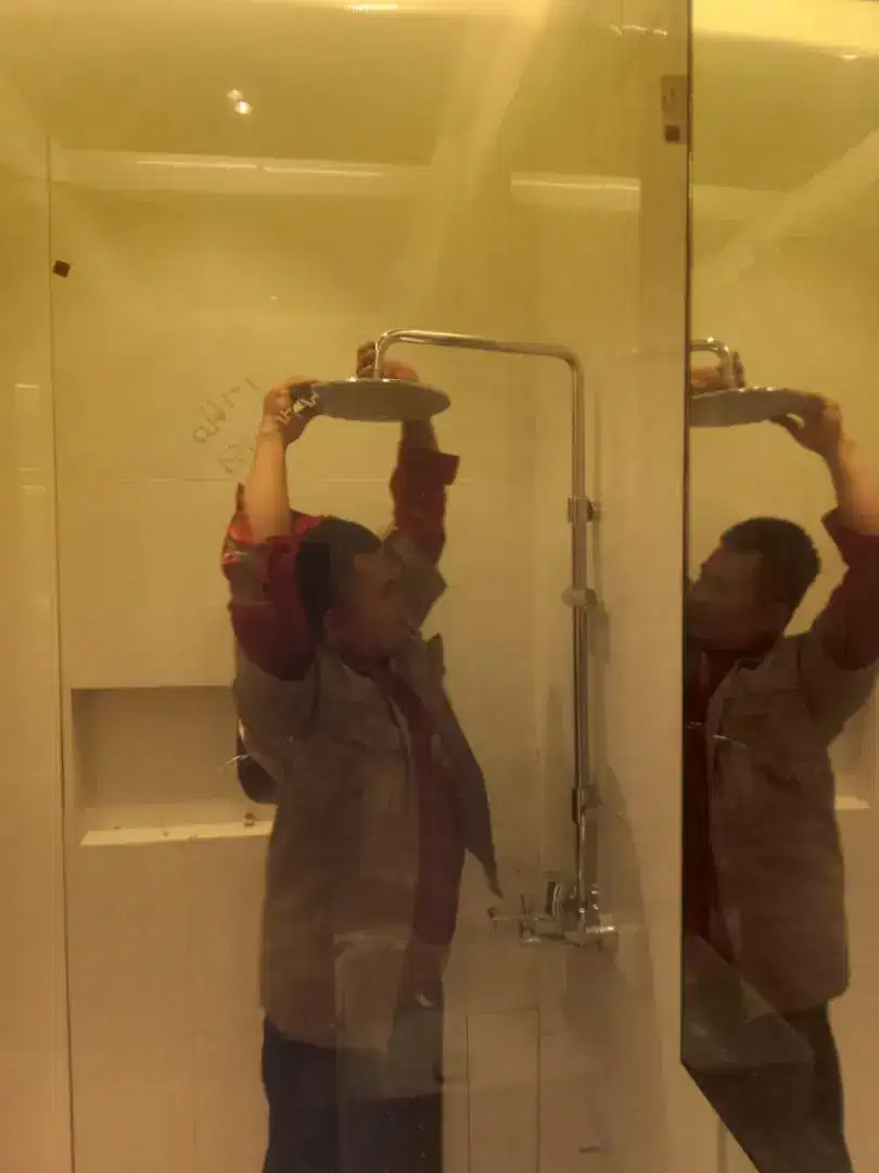 Perbaikan keran shower