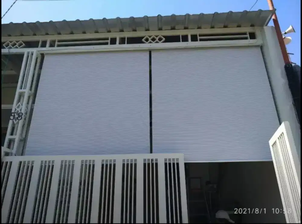 Tirai penahan hujan dan panas matahari termurah