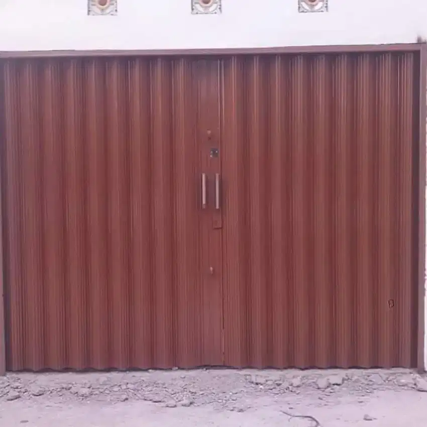 Folding gate roling door