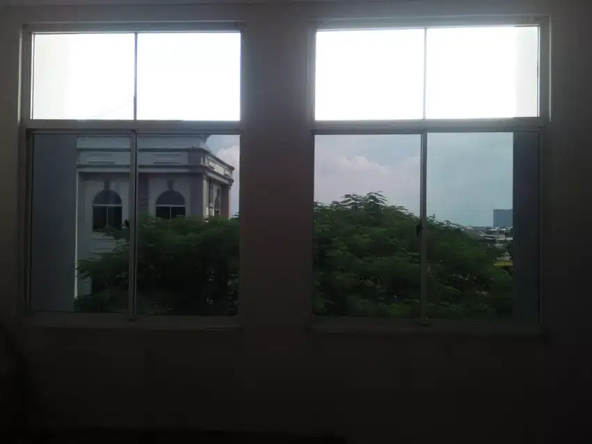 Spesialis Kaca Film Gedung/Stiker Kaca