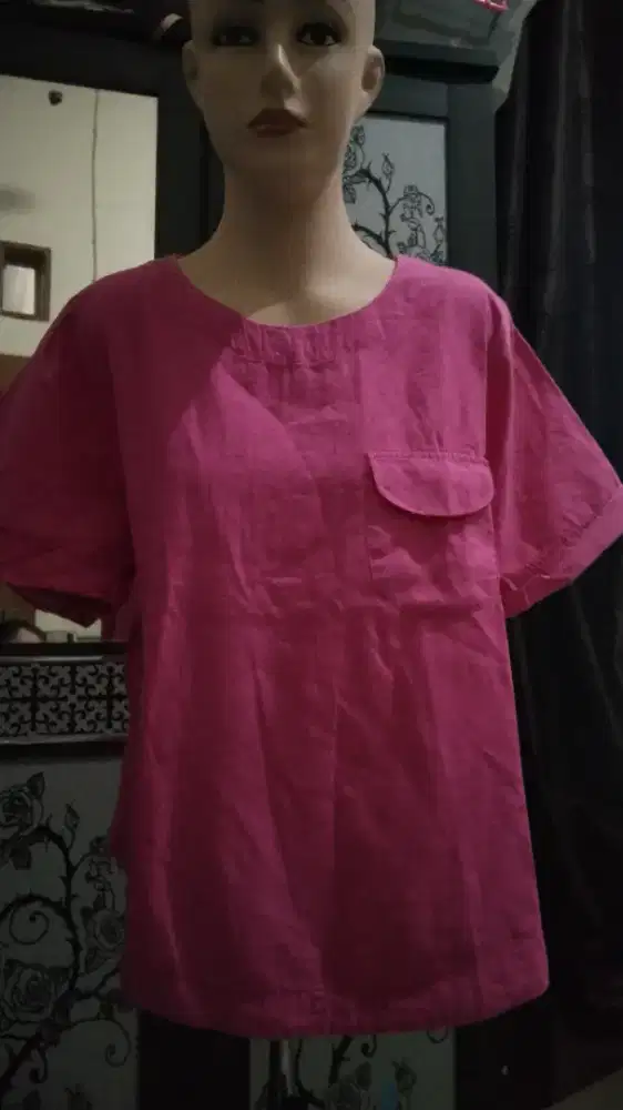 Atasan pink kantong depan