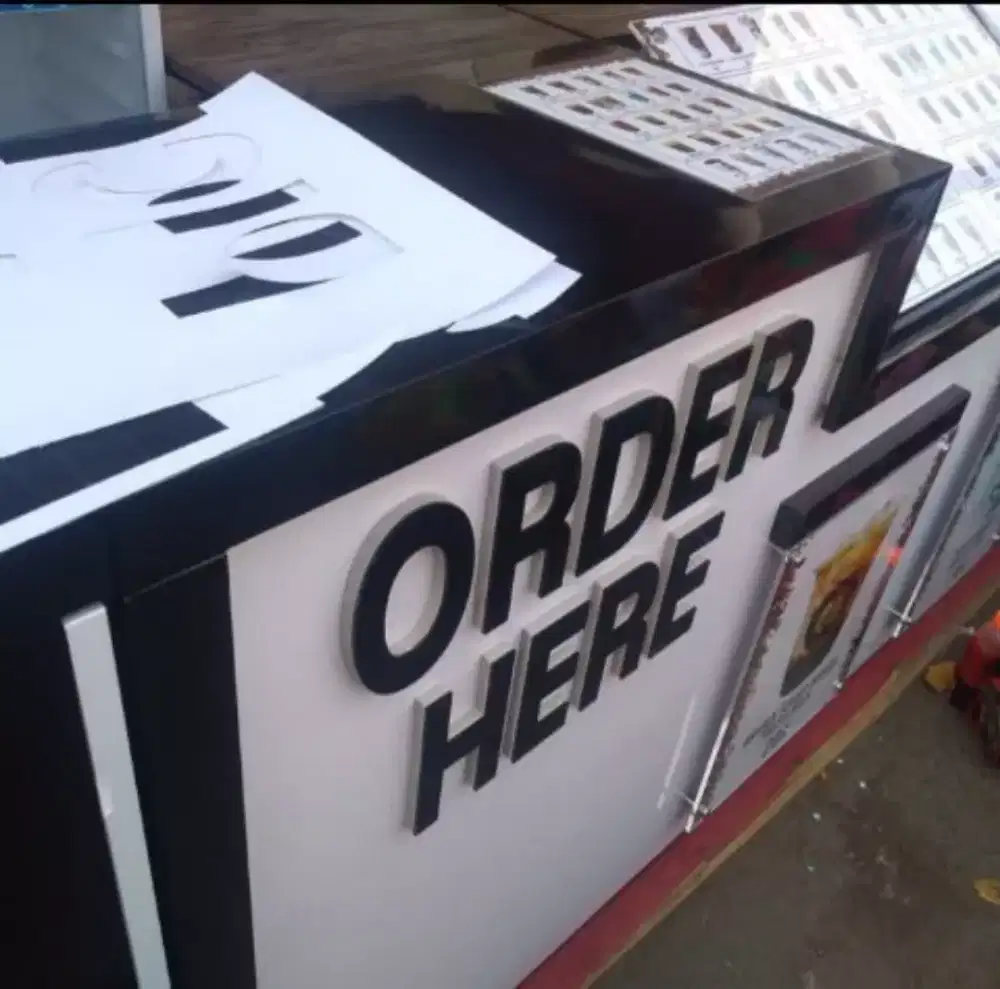 Huruf timbul lapis spon