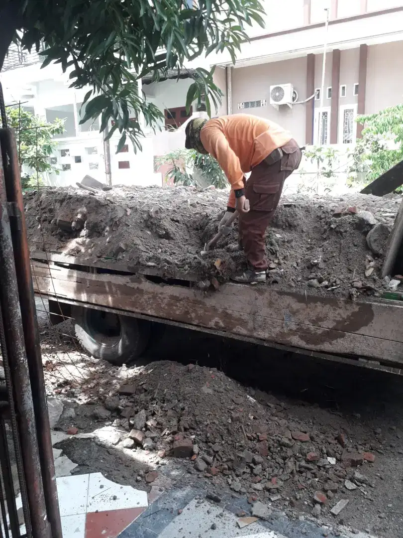 Urug buang puing sampah urugan puing tanah merah campur pengurugan