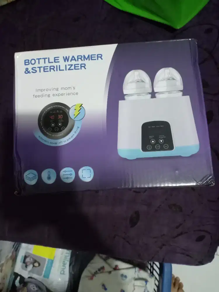 Steril boto susu dan penghangat susu (bottle warmer and sterilizer)