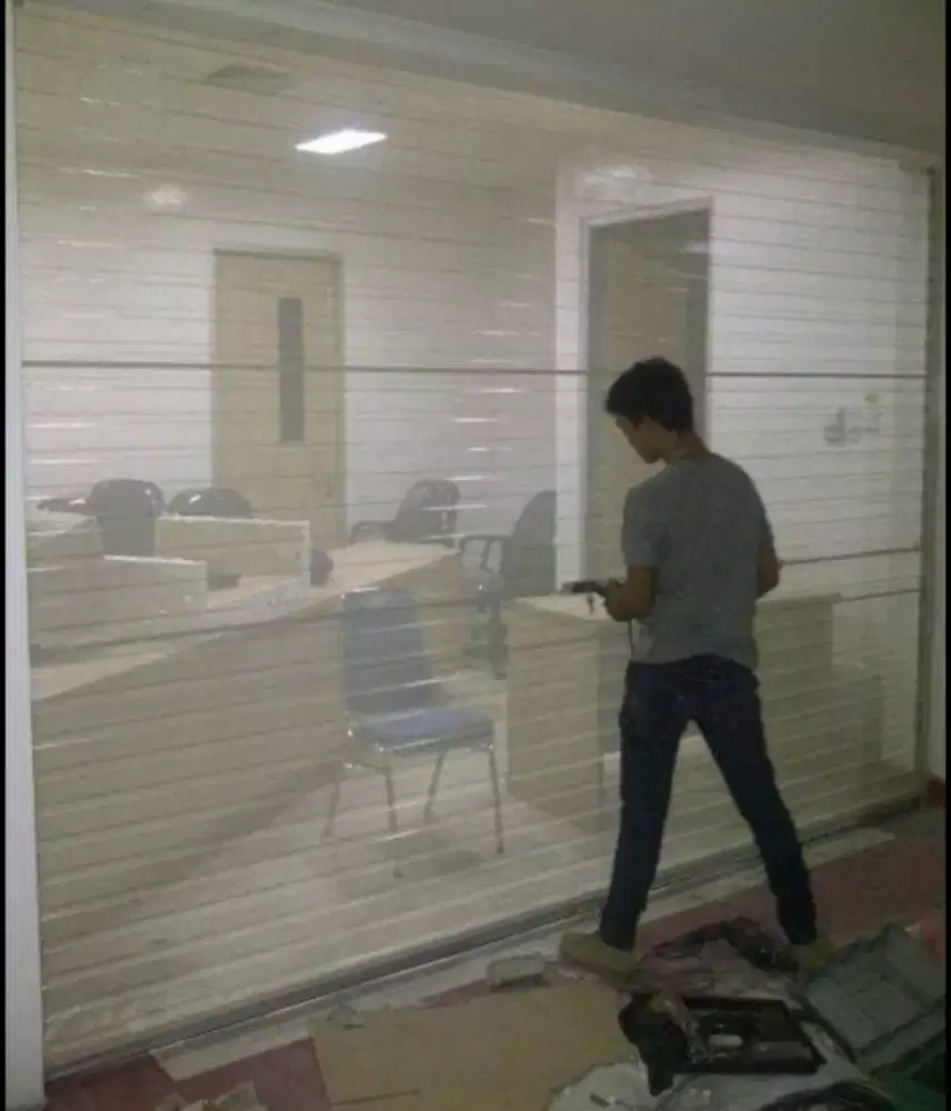 mengerjakan roling door pintu polding geet servis dll