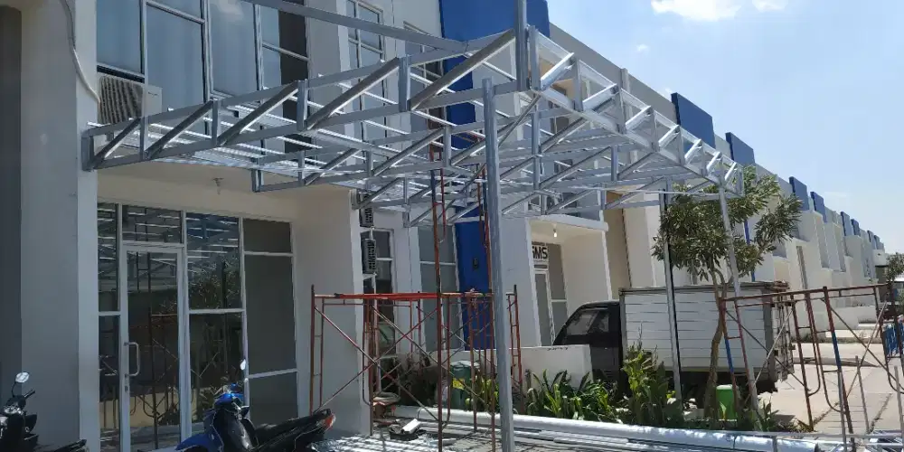 Renovasi atap baja ringan TASO dengan genteng metal/spandek