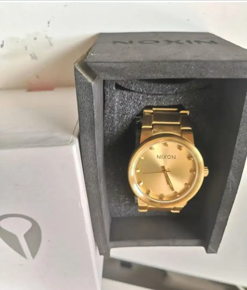 Harga jam nixon online gold