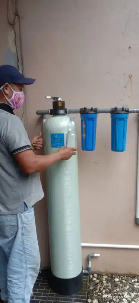 Filter saringan air kuning bau besi karat berminyak warna hitam keruh