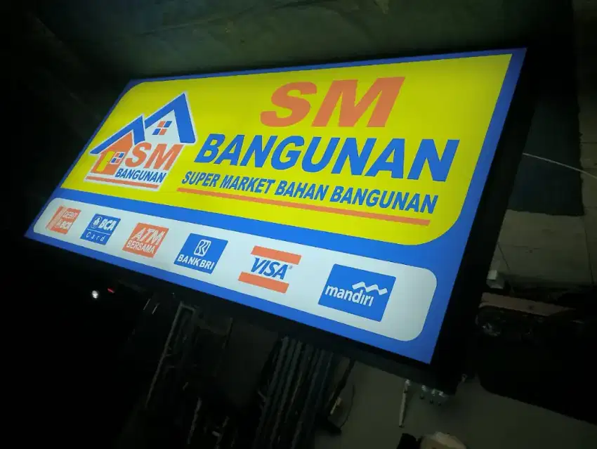 Plang papan nama neonbox reklame billboard toko bangunan