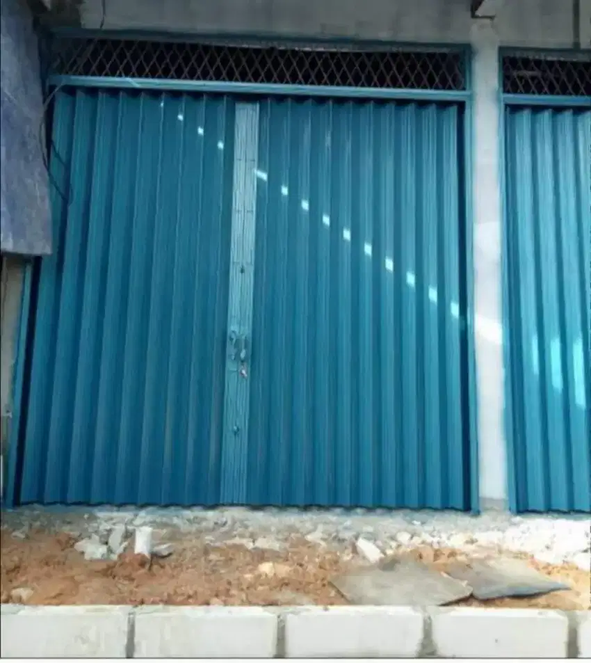 Folding gate rolling door