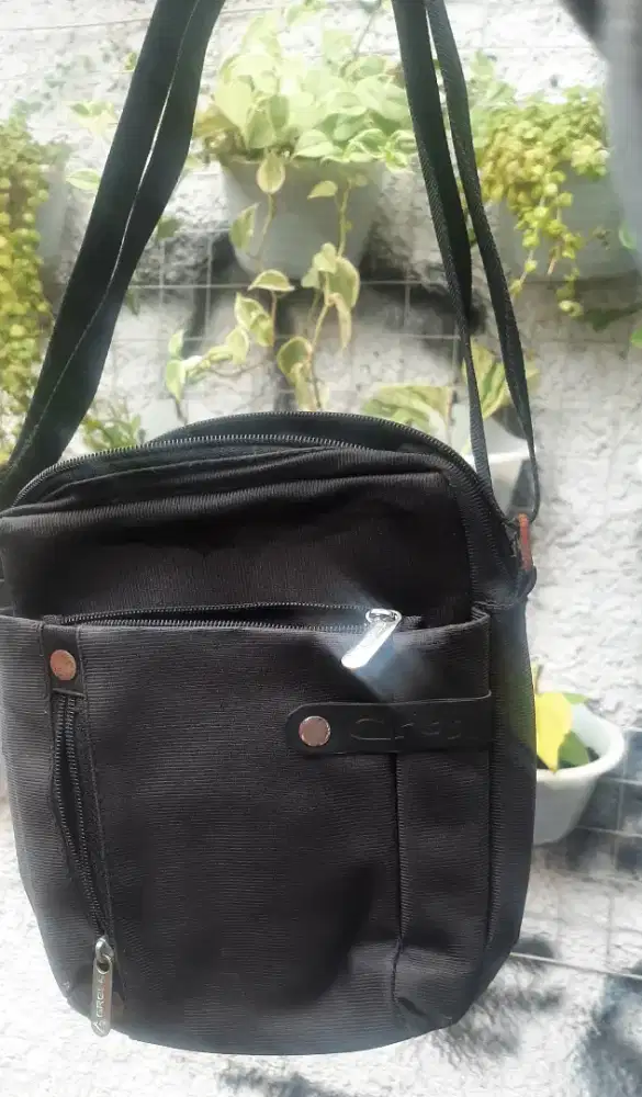 Tas pria ukuran kecil