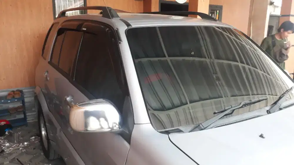 ganti atau pasang kaca film mobil panggilan