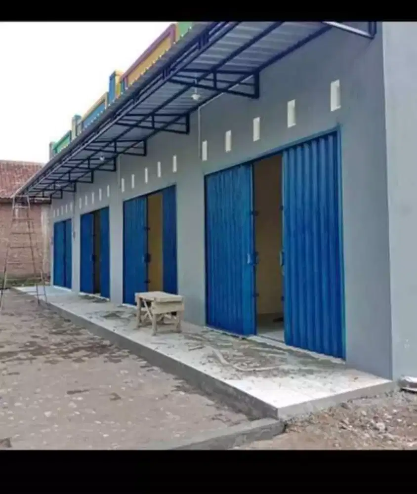 mengerjakan pintu rolong door polding geet servis dll