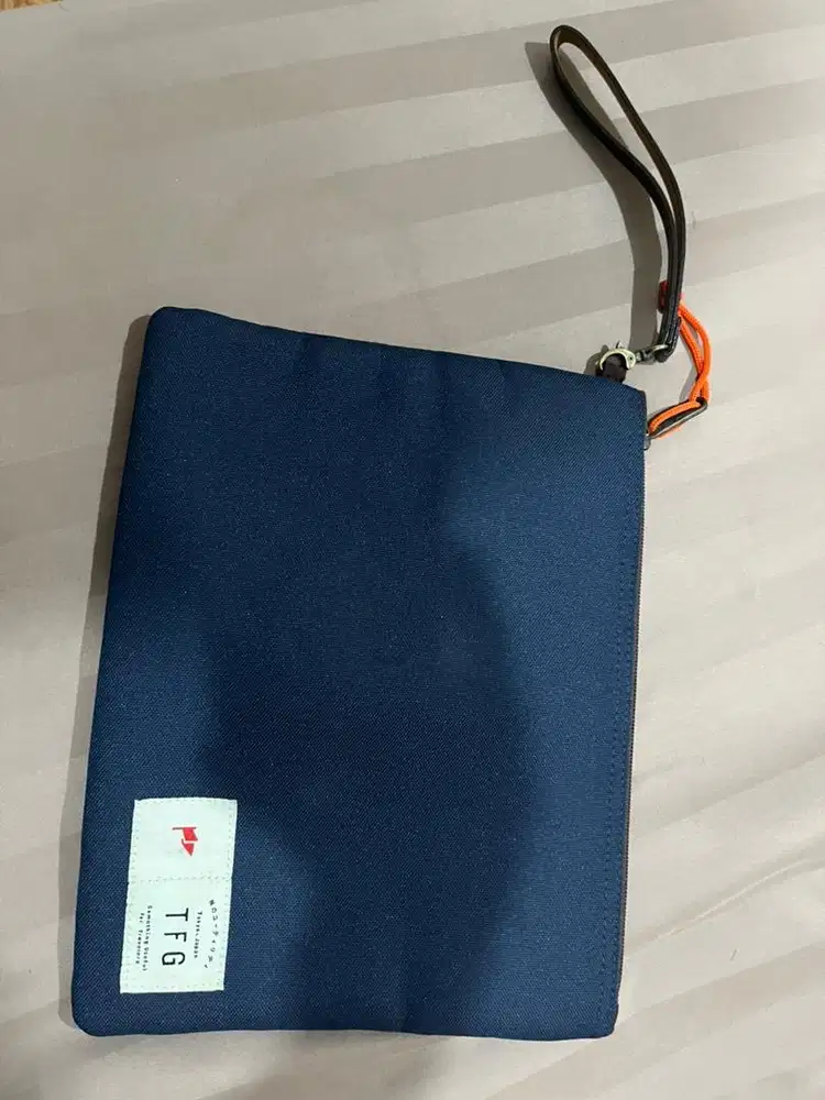 tas clutch pouch pria merk TFG