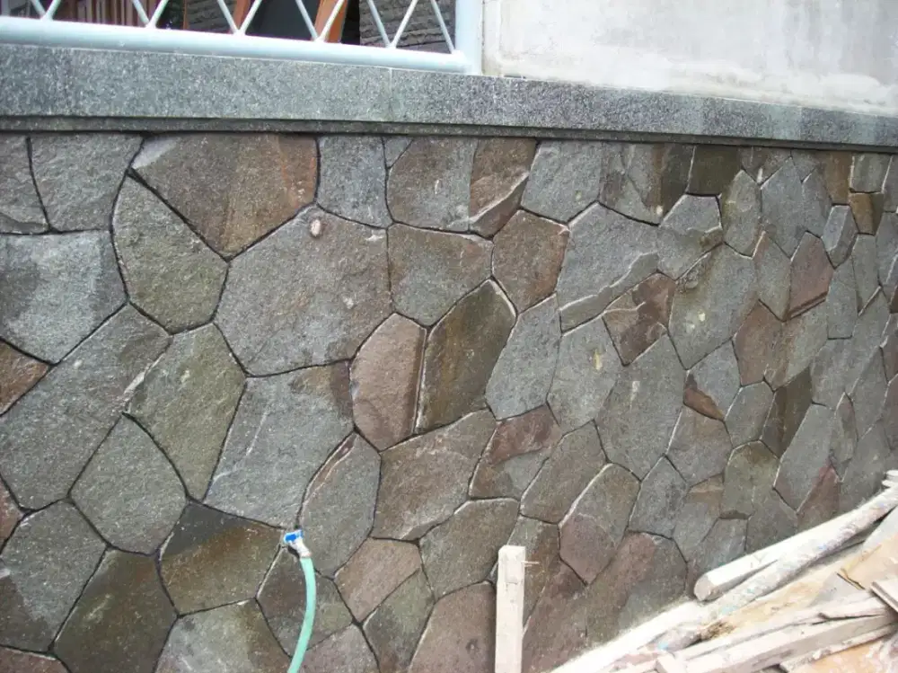 Pengadaan dan Pemasangan Batu Templek