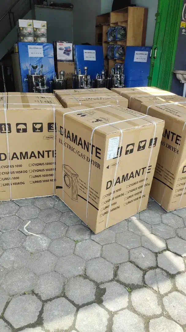 Mesin Pengering Pakaian dan Setrika Uap Boiler