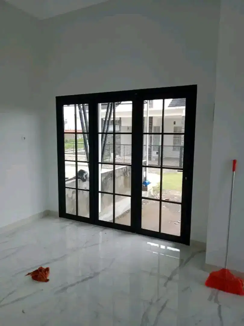 Pintu kaca lipat dan pintu kaca sleding aluminium upvc