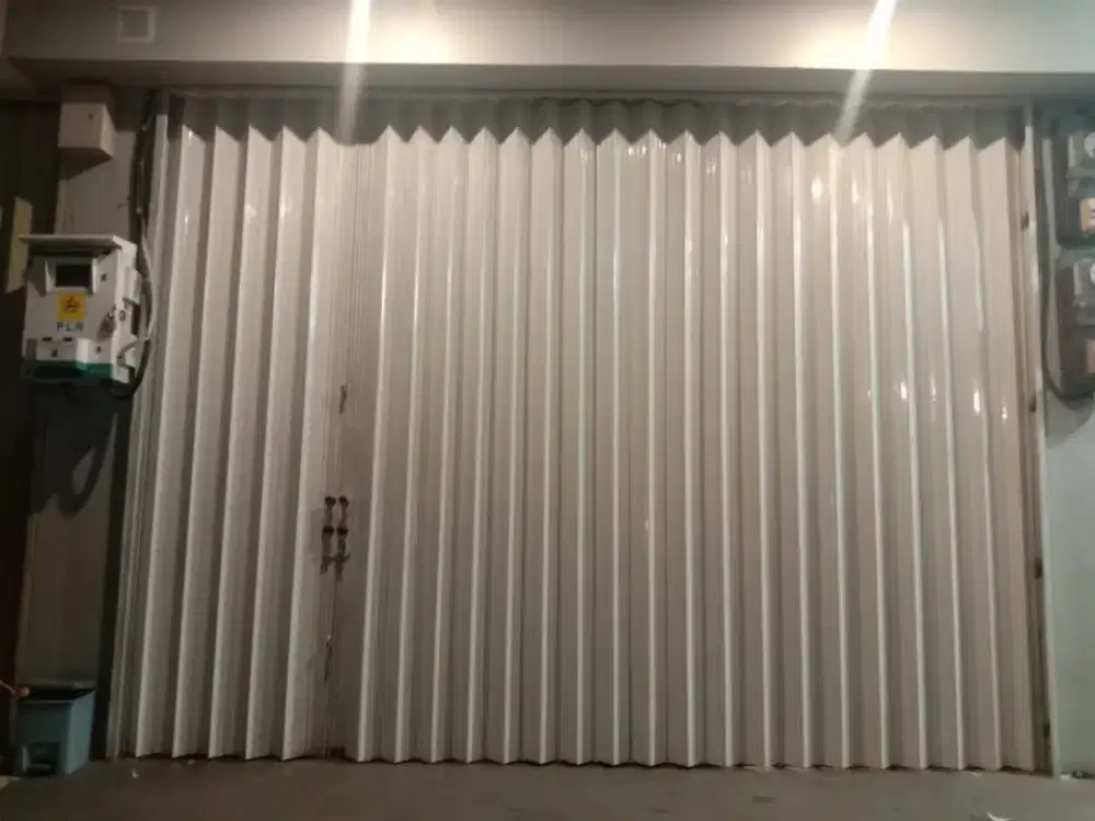 Folding gate Erha clinik pantai indah kapuk Jakarta barat