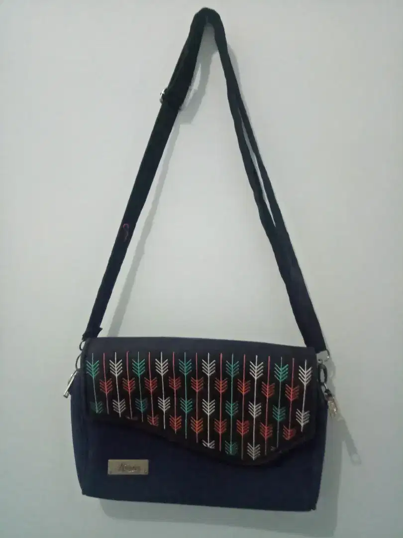 Tas slempang biru