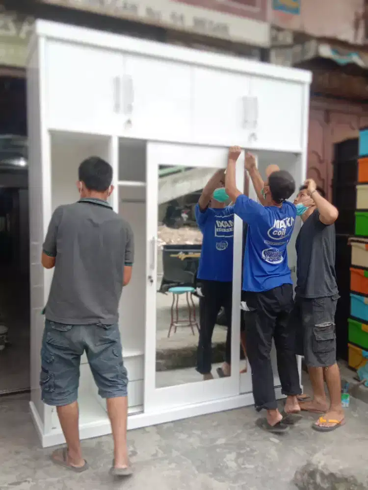 lemari hpl/sofboat jasa bongkar pasang lemari