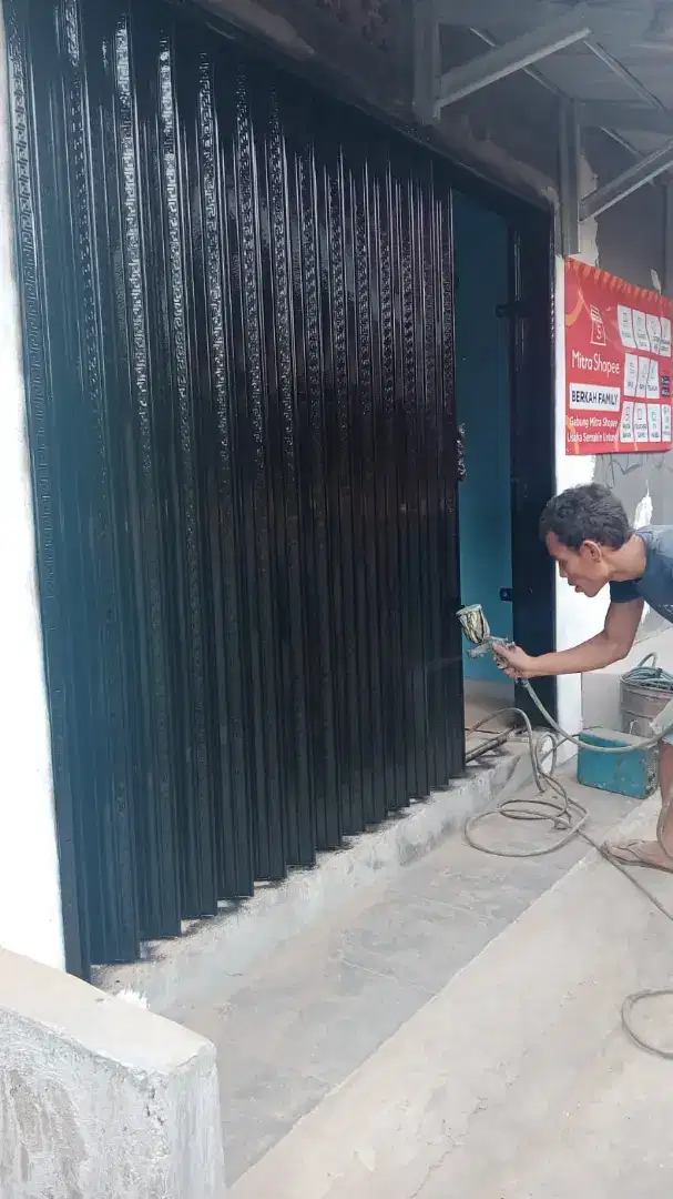 Folding gate rolling door