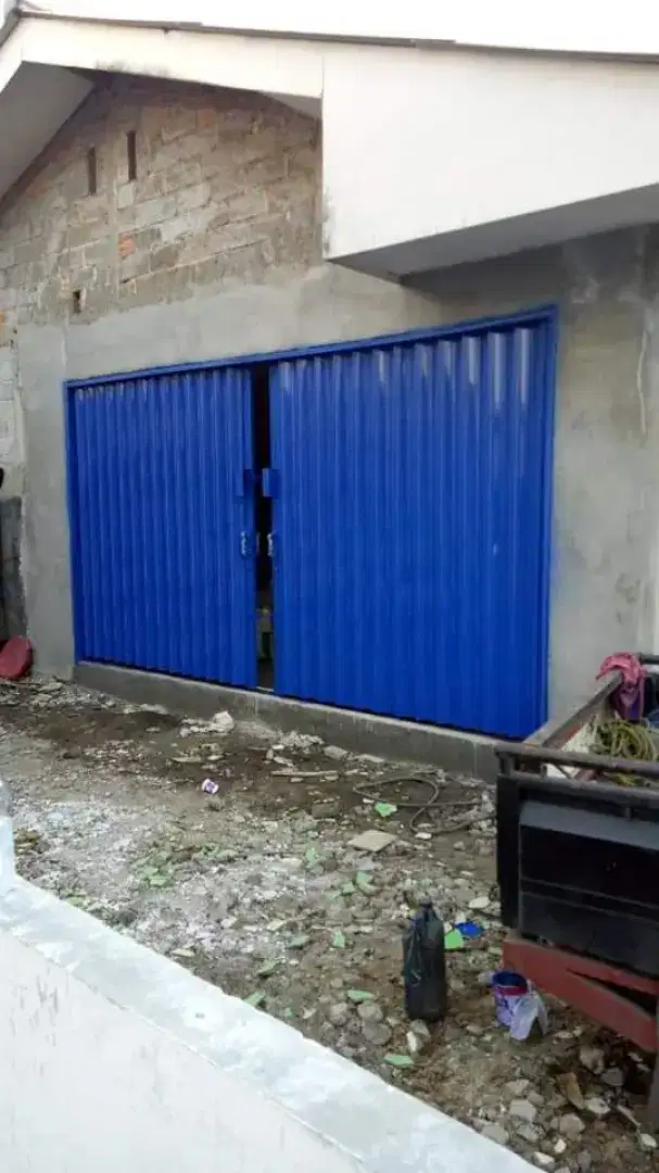 Rolling door folding gate