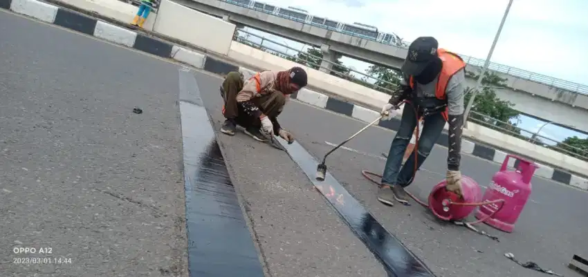 Aspal ticplug atau expantion joint brand roadking high quality
